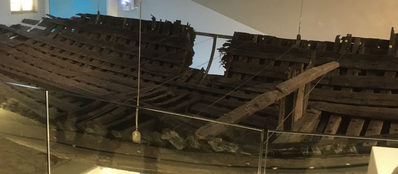a wreck of a ship in a musuem