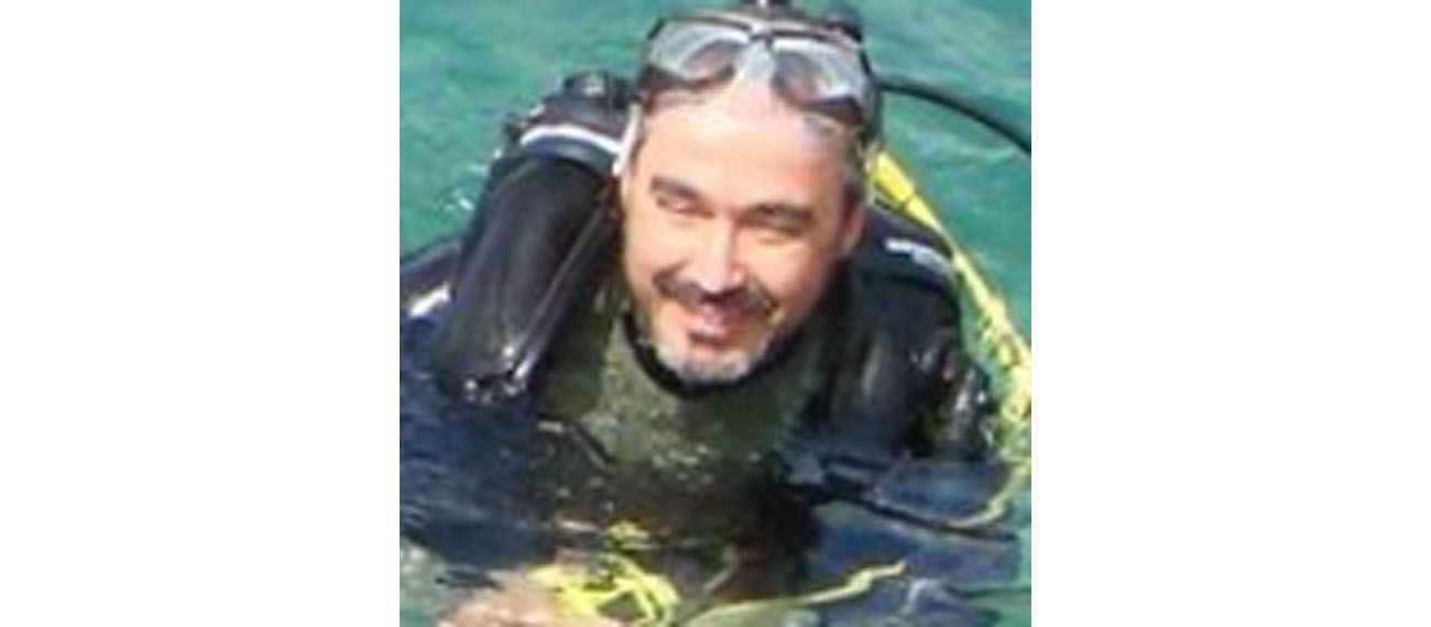 a man with diving suit